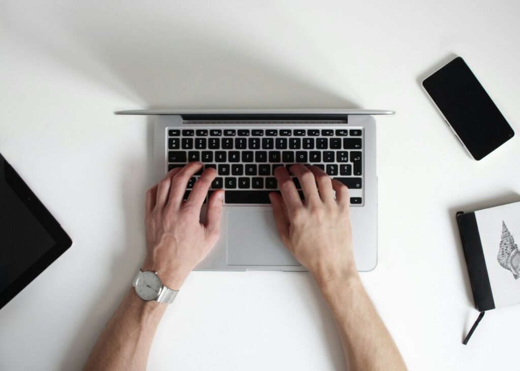 A laptop on a desk during a website planning session